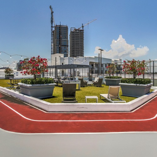Outdoor Track Red and white fitness track on the rooftop of Loftin Place.