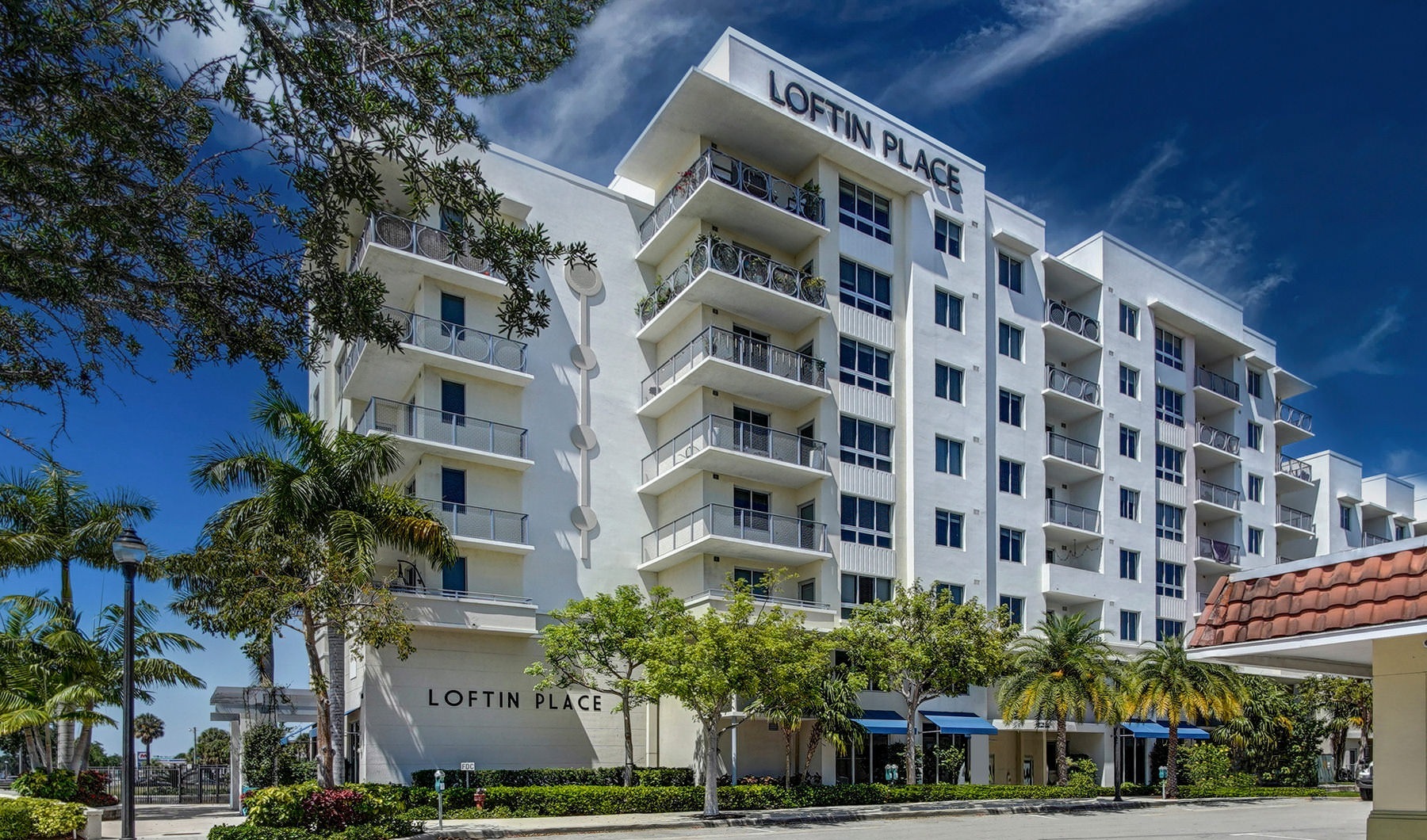 Exterior view of Loftin Place apartments in West Palm Beach