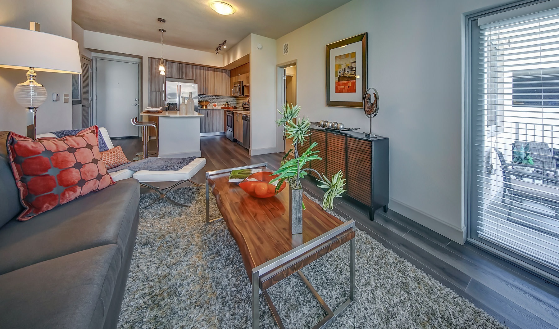 Style Everywhere You Look Open living room and kitchen at Loftin Place apartments in West Palm Beach